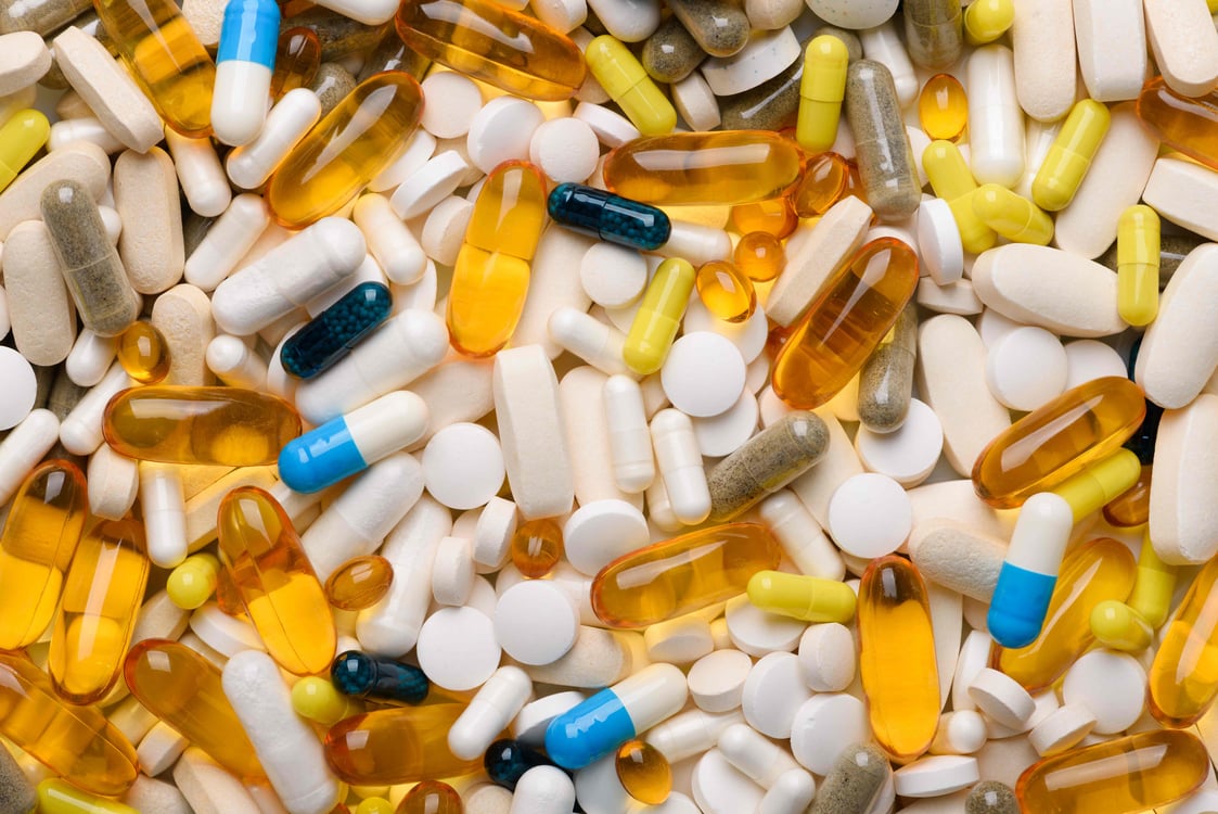 Pills spilling out of a bottle